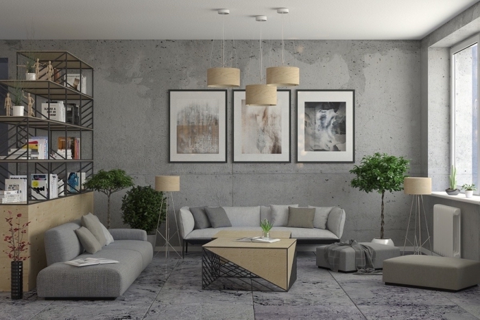 meuble rangement ouvert en métal, décoration salon industriel avec canapés en gris et table basse, mur de cadres noirs