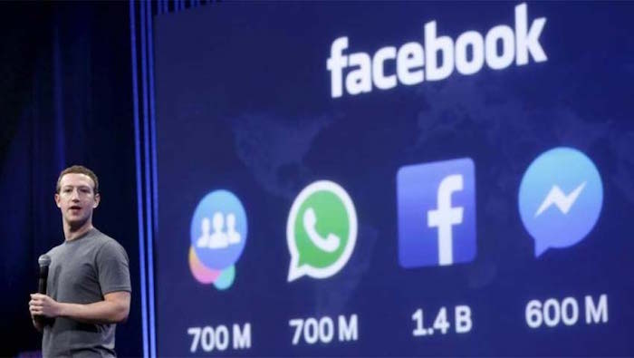photo Mark Zuckerberg devant les logos de Facebook Messenger et WhatsApp qui ont été touchés par la panne