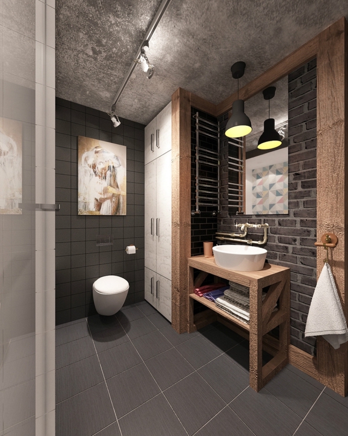 design intérieur contemporain dans une petite salle de bain, deco industrielle avec dalles en gris foncé et plafond effet béton