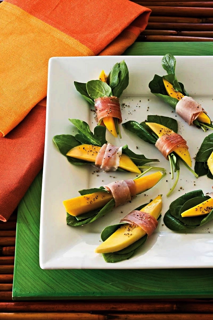 recette healthy d'amuse bouche apéritif facile, bouchées de mangue et de prosciutto au basilic pour un apéro estival léger