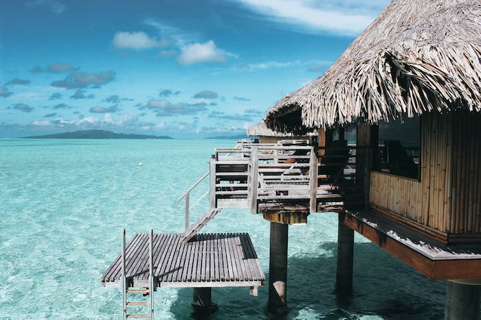 Bora bora maison dans l'eau, fond ecran nature, paysage paradisiaque, photographie professionnelle de polynesie francaise