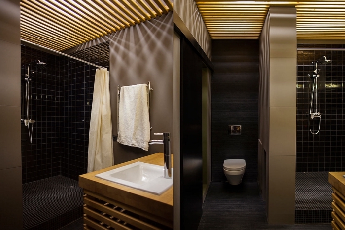 agencement salle de bain avec cabine de douche moderne, idée carrelage salle de bain en noir, peinture murale nuance taupe
