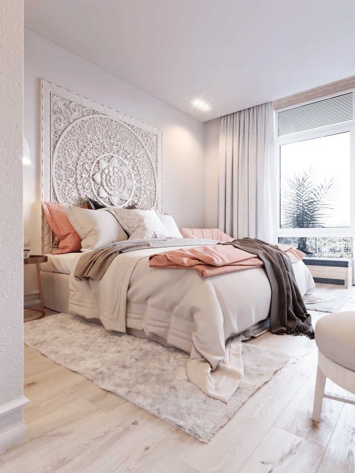 design intérieur moderne dans une chambre adulte aux murs blancs avec meubles blanc et bois, modèle tête de lit de style orientale