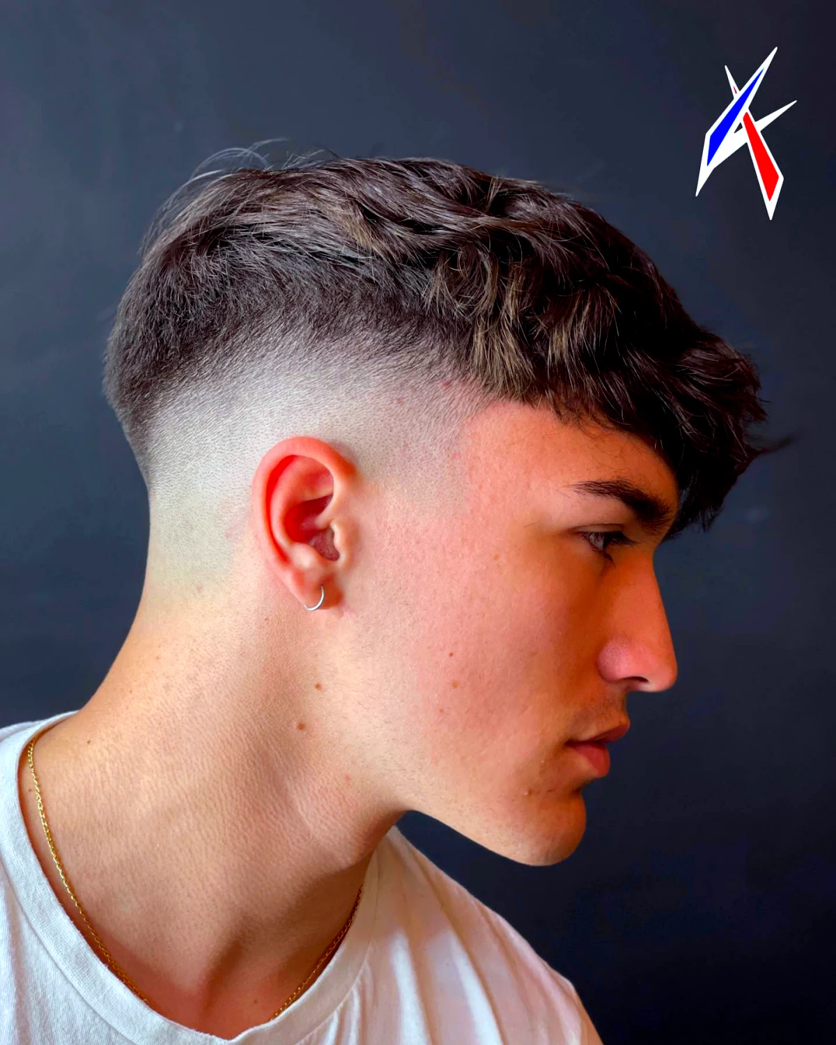 mid fade coiffure homme tendance 2024