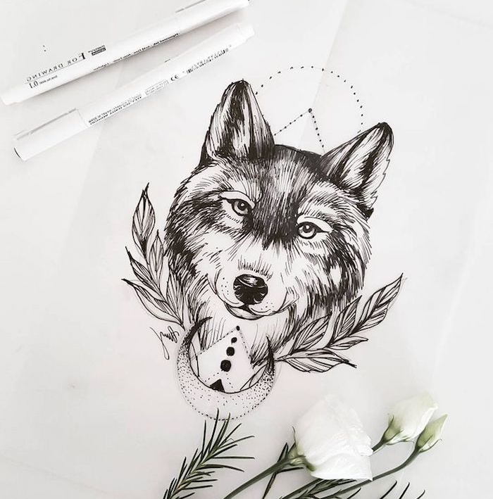 dessin noir et blanc simple de tete de loup entourée de feuillages et croissant de lune, idée dessin tatouage