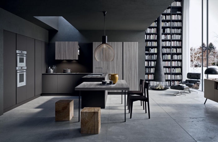 modèle de cuisine noir mat aménagée en l avec îlot table à manger, design intérieur moderne aux couleurs foncées