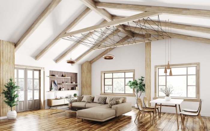 idée deco salon moderne en blanc et bois de style scandinave, aménagement espace ouvert à plafond à deux pentes