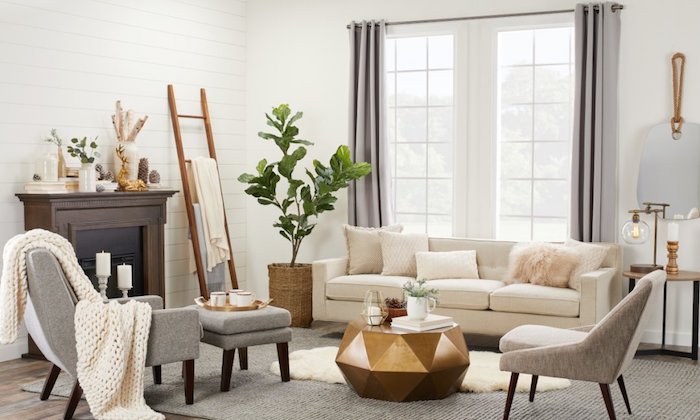 Échelle de rangement dans un salon bien aménagé, canapé blanche, fauteuil gris, table basse hexagone, chambre rose et gris, sophistiqué décoration design