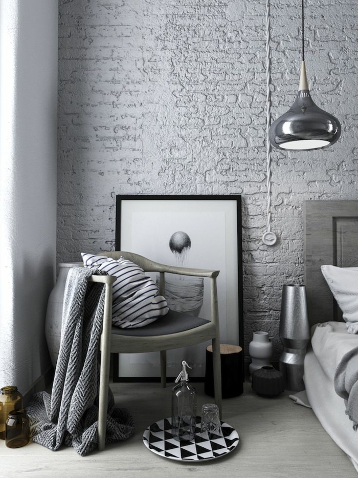 Mur briques peinte en gris, deco chambre moderne, idée déco chambre adulte, coin de lecture dans la chambre à coucher 