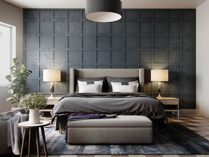 Gris sombre sur un des murs, lit confortable gris nuance, décoration chambre à coucher, peinture grise association