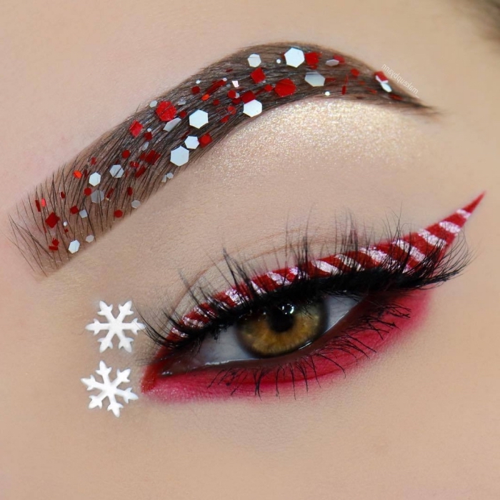 exemple de maquillage des yeux original pour Noël, make-up paupières rouge et blanc façon bonbon et sourcils Noël