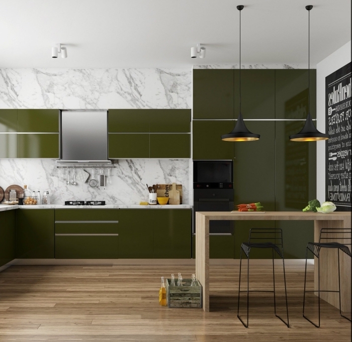 idée de couleur complémentaire du vert dans une cuisine moderne et stylée au sol stratifié avec crédence marbre