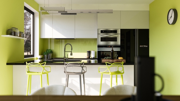 exemple comment combiner la couleur vert anis avec le blanc et le noir dans une cuisine moderne aménagée en U