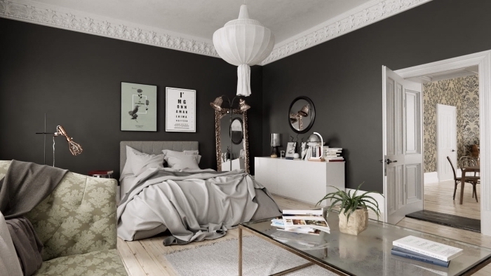exemple de chambre gris et blanc avec accents en vert, idée comment décorer une pièce aux murs foncés avec meubles blancs et gris
