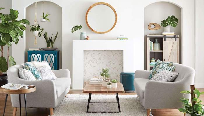 Salon chic plante pour chambre décoration, choisir sa plante verte intérieur, miroir ronde, deux canapés gris, table basse en bois 