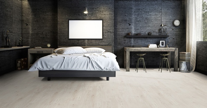 Le sol en vinyle et son adaptabilité s'accoree parfaitement à la chambre à coucher