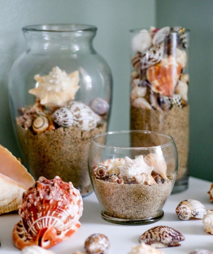 decoration bord de mer idée terrarium coquillages que faire avec des coquillages ramassés sur la plage sable dans recipient en verre