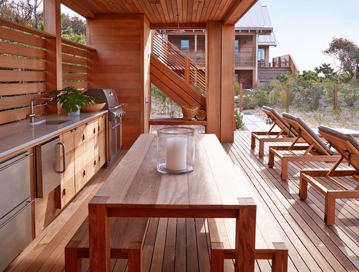 design cuisine exterieure complete transats extérieur moderne table à manger bois banquette bois éclairage extérieur led