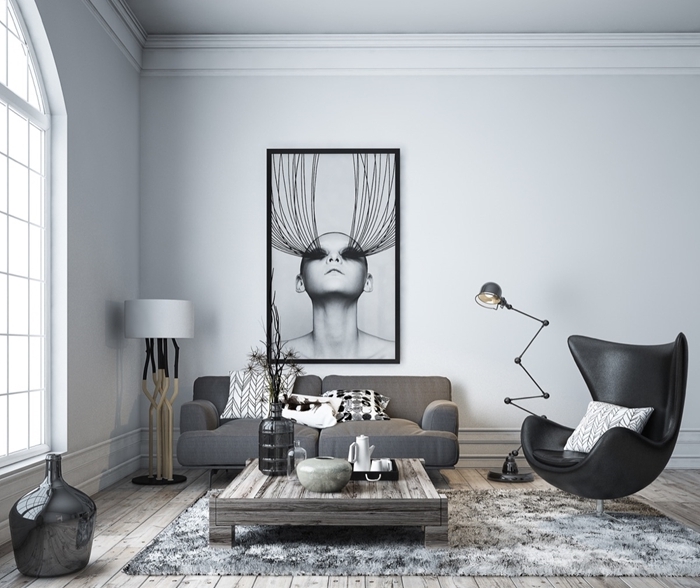 fauteuil design moderne noir table basse bois foncé lampe sur pied blanc et bois avec pieds bois cadre noir et blanc