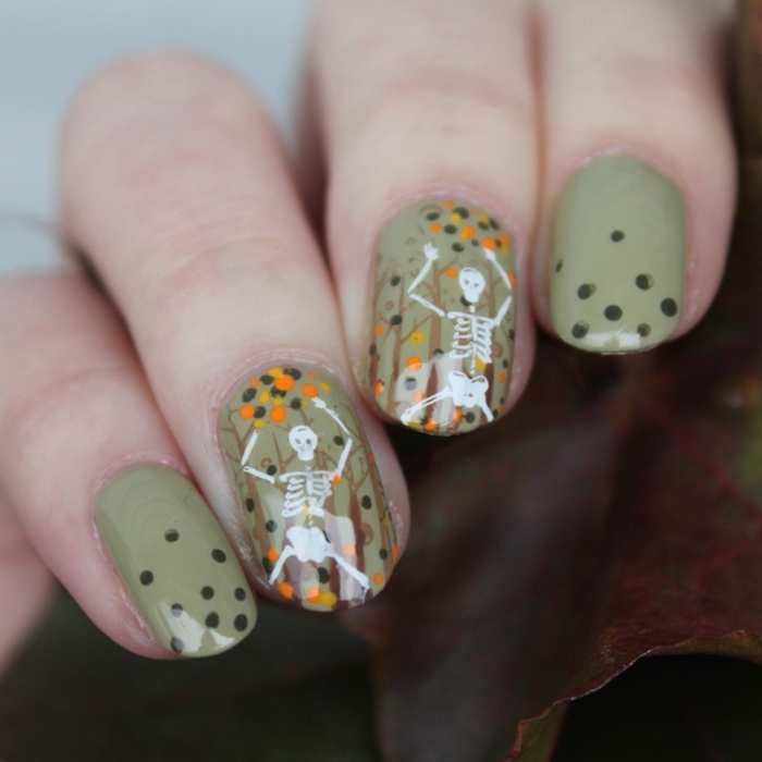 vernis à ongles de couleur vert pastel avec nail art facile pour halloween manucure ongle en gel couleur pastel dessin arbres feuilles automne