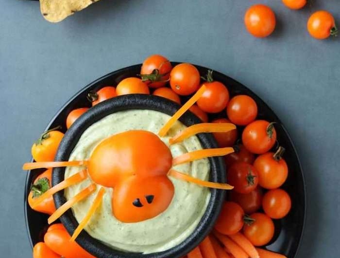 entree halloween dip araignee effrayant avec des tomates cerises et petit carrots