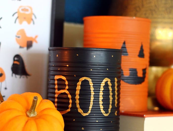 faire une decoration halloween originale dans boite de coserve recyclage creatif peinture noire ou orange et motif halloween original