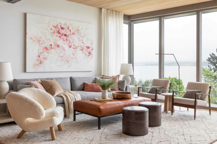 grand tableau art abstrait point focale de salon avec belle vue ambiance cocooning couleur peinture salon moderne canapé gris