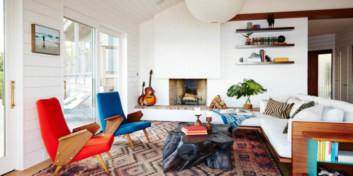 intérieur moderne avec meubles style rétro canapé cosy salon chaleureux peinture pour salon guitare pres de la cheminee