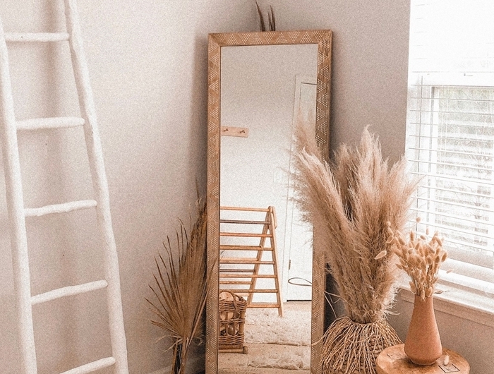 pampa sechee miroir cadre bois design intérieur style boho moderne fibre naturelle accessoires textile fausse fourrure tapis blanc