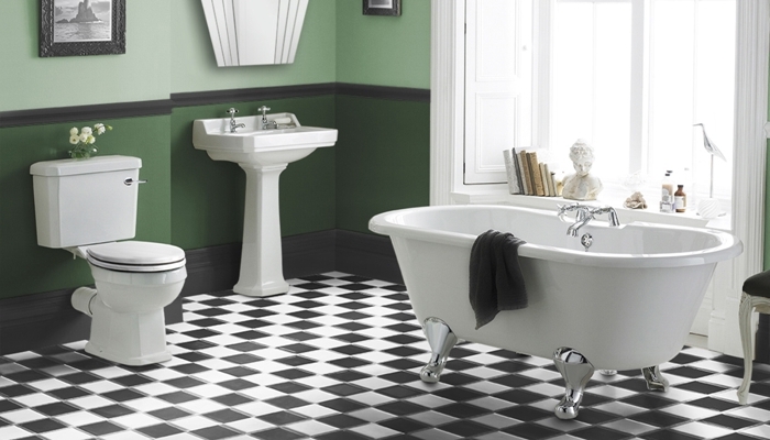 carrelage salle de bain retro motifs carreaux baignoire sur pied peinture murale vert foncé cadre photo noir