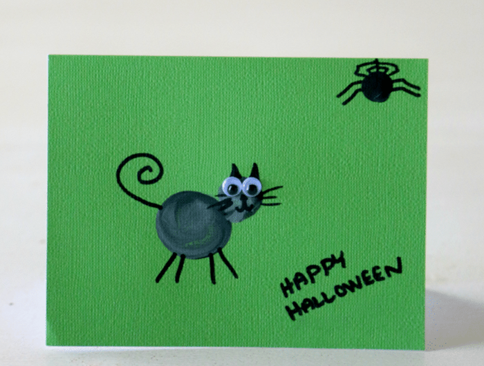 dessin halloween facile a faire papier cartonné vert dessin chat noir yeux mobiles araignée dessin simple joyeux halloween