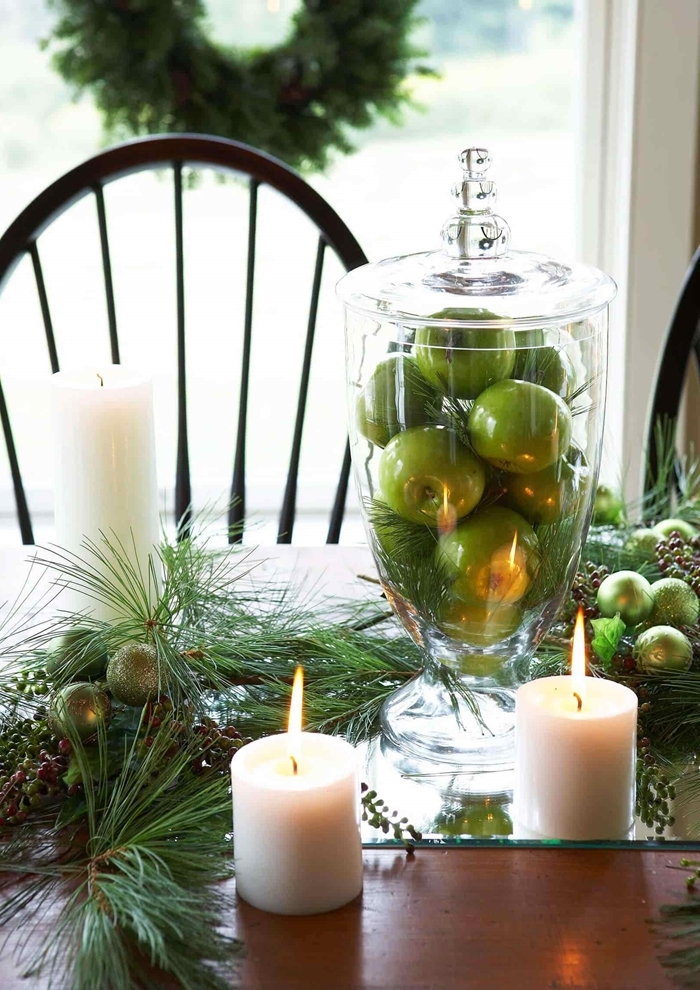 bol fruits pommes vertes table de noel décoration nature centre de table bougies blanches branches de sapin