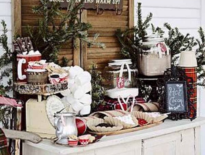 creer un buffet de noel qvec un commode en bois blanc et des etoiles de noel au dessous