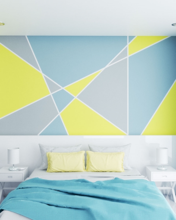 deco chambre peinture formes triangulaires spots led éclairage meuble de chevet blanc lampe de chevet coussin oreillers jaune