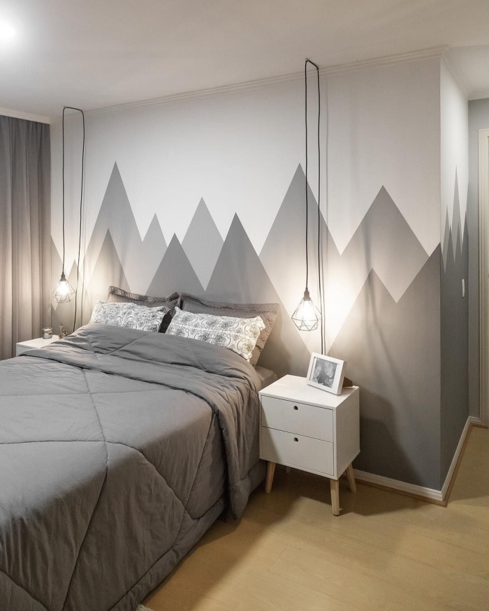 design chambre minimaliste revêtement sol bois meuble chevet blanc cadre photo blanc et noir deco chambre peinture gris et blanc