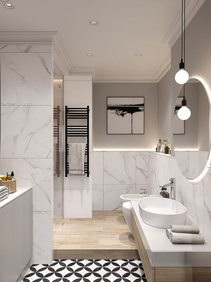 salle de bain en longueur décoration style moderne carrelage marbre miroir led rond lampe suspendue