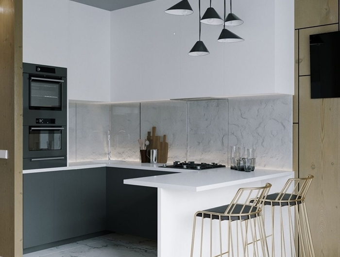 cuisine contemporaine carrelage aspect marbre blanc crédence éclairage plan de travail blanc lampe suspendue