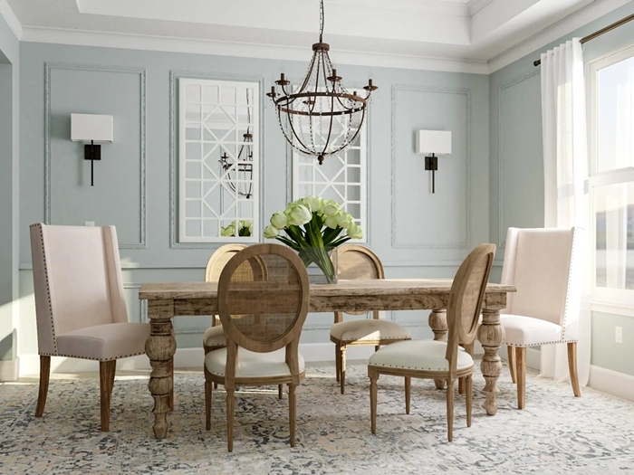 meuble salle à manger chaise fauteuil rose pastel pieds bois table manger bois clar tapis blanc lustre métal
