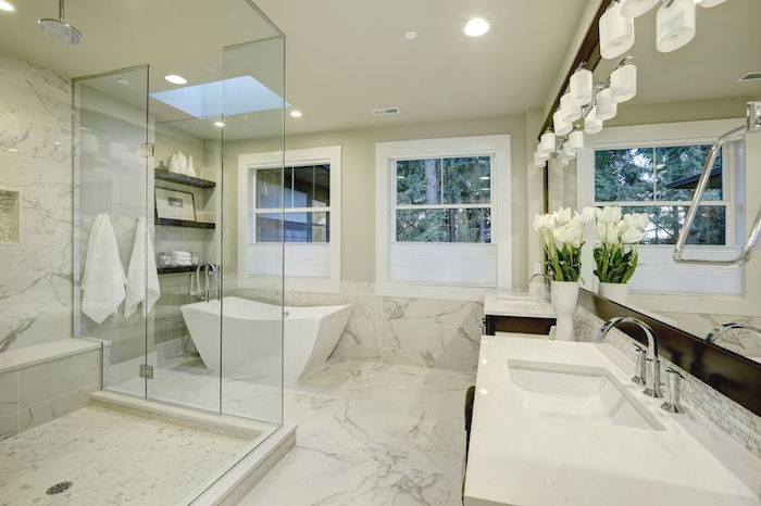 amazing master bathroom with large glass walk in shower