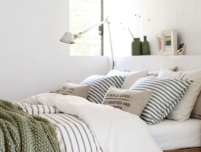 décoration chambre à coucher blanche meubles bois cadre de lit bois couleur vert kaki vase vert