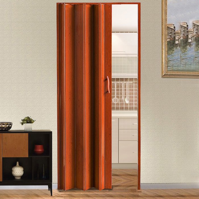 relooker porte interieur avec un mechanisme pliant en couleur orange dans la salle de séjour