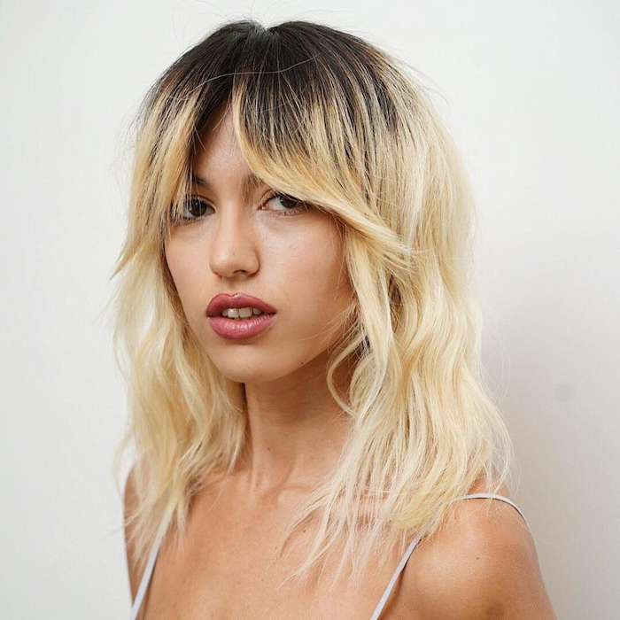 newest shaggy bob hairstyles with curtain bangs within women's messy platinum blonde wavy textured lob with fringe curtain