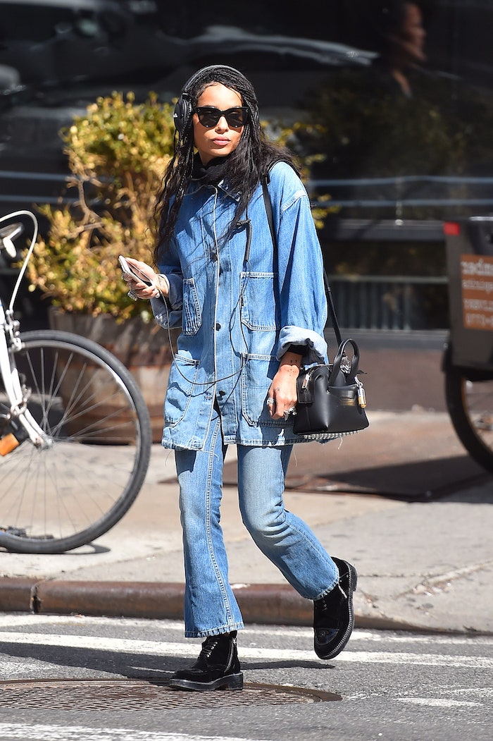 American clothing style with an all denim look and black sunglasses
