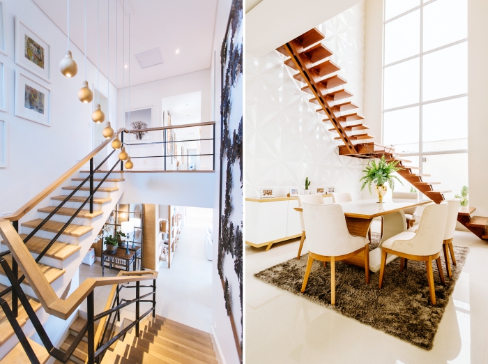 design intérieur conception moderne escalier bois et métal mur de cadres éclairage lampe suspendue laiton