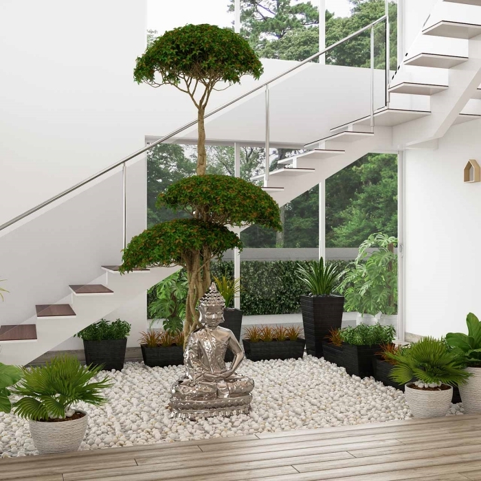 décoration jardin zen intérieur aménagement sous escalier sans contremarche galets blancs statue bouddha