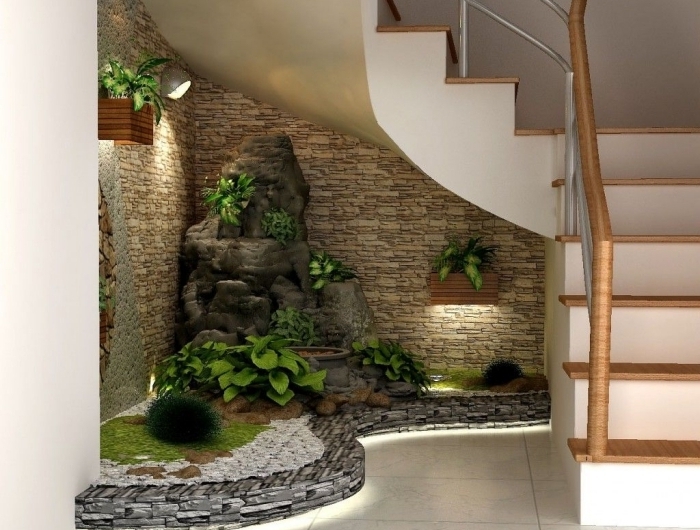fontaine zen cache pot jardnière bois aménagement sous escalier ouvert plantes vertes éclairage