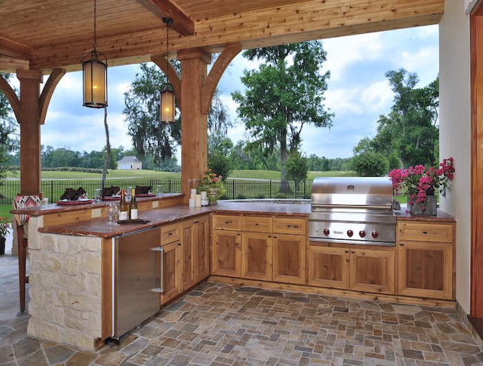 idee deco veranda en style contemporain avec une vue qui donne aux champs et des placards en bois