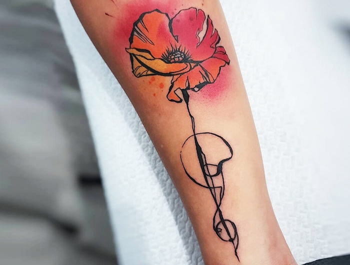 tatouage coquelicot en style aquarelle et culeurs rouge et jaune sur l avant bras