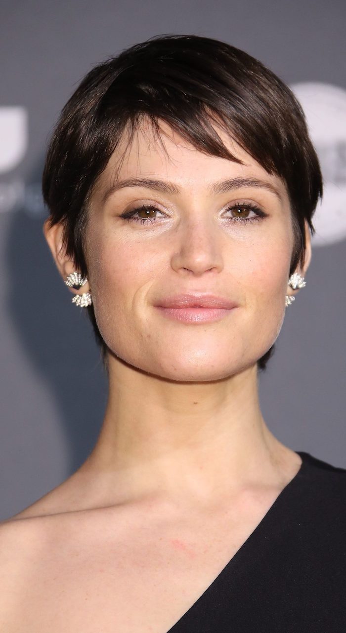 Modern women's hairstyles with brown bangs with elegant earrings and evening dresses