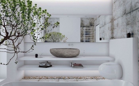 vasque en pierre naturelle grise salle de bain toute en blanc mur en travertin arbre en deco
